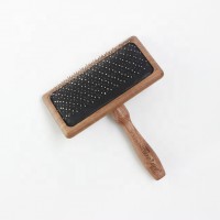 cat  sliker  brush with wood handle